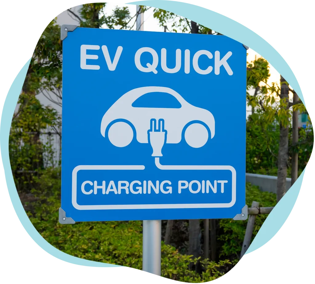 Traditional internal combustion vehicles sitting in traffic releasing emissions.